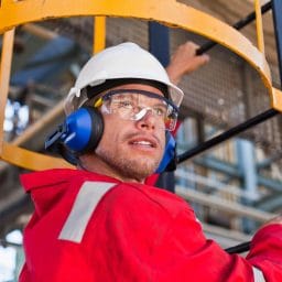 Man wearing hearing protection on the job.